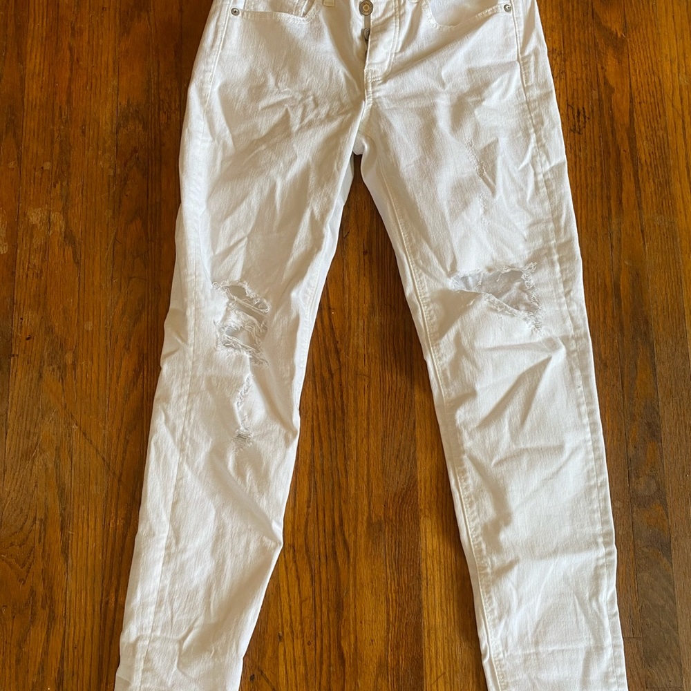 white jeans with rips